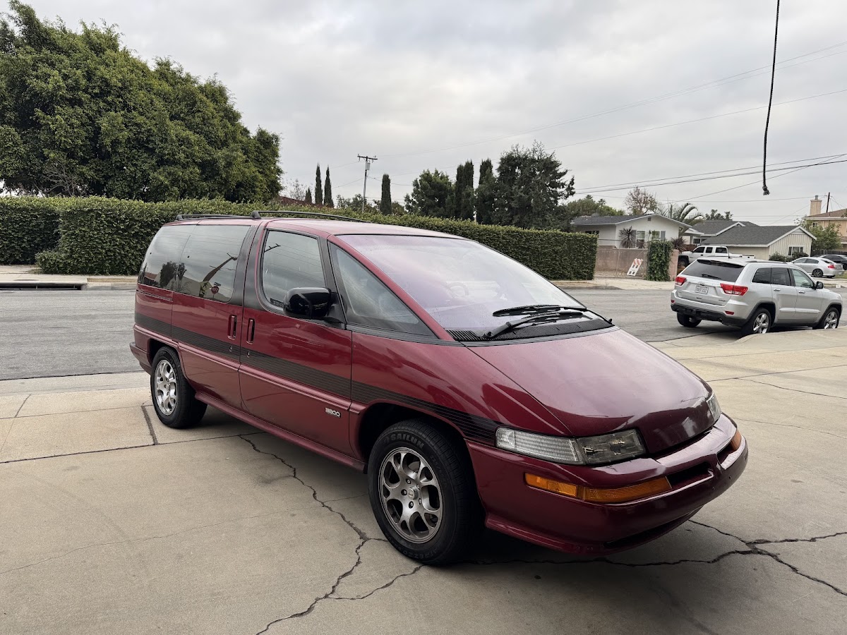 A customer's minivan on the forecourt at White Automotive