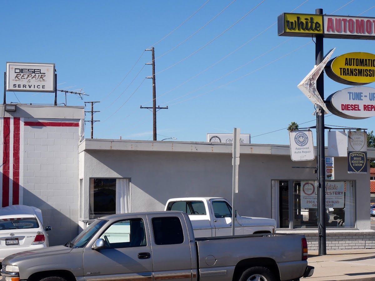 White Automotive on E Whittier Blvd, with the diesel repair and service rooftop sign and the AAA approved badge